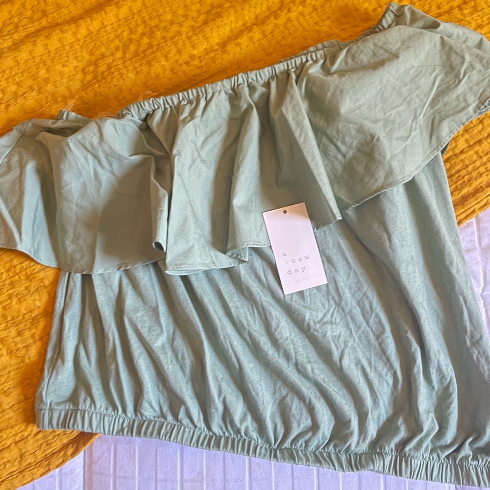 New day (target) sage green top.   Off one shoulder. Brand new tags attached.